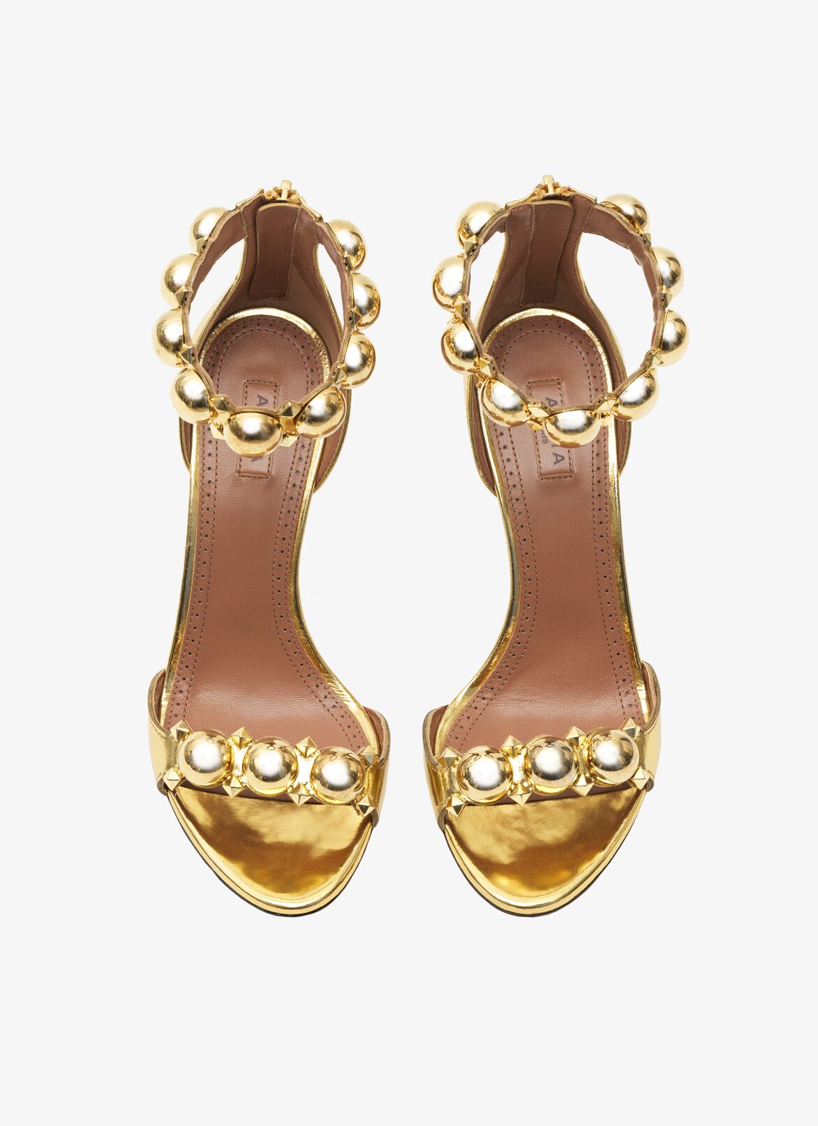 Bombe sandals in metallic goatskin ALAÏA GOLD BOMBE SANDALS IN METALLIC GOATSKIN